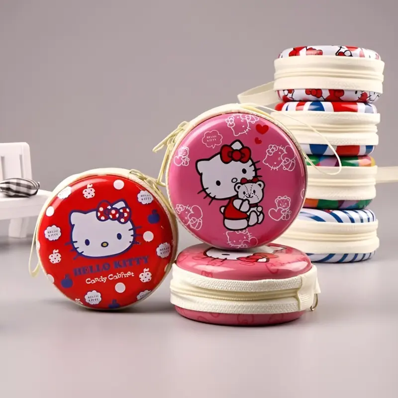 Two red and pink Hello Kitty themed Coin Pouch Round Tins in the foreground, with a stack of other colorful round pouches in the background.