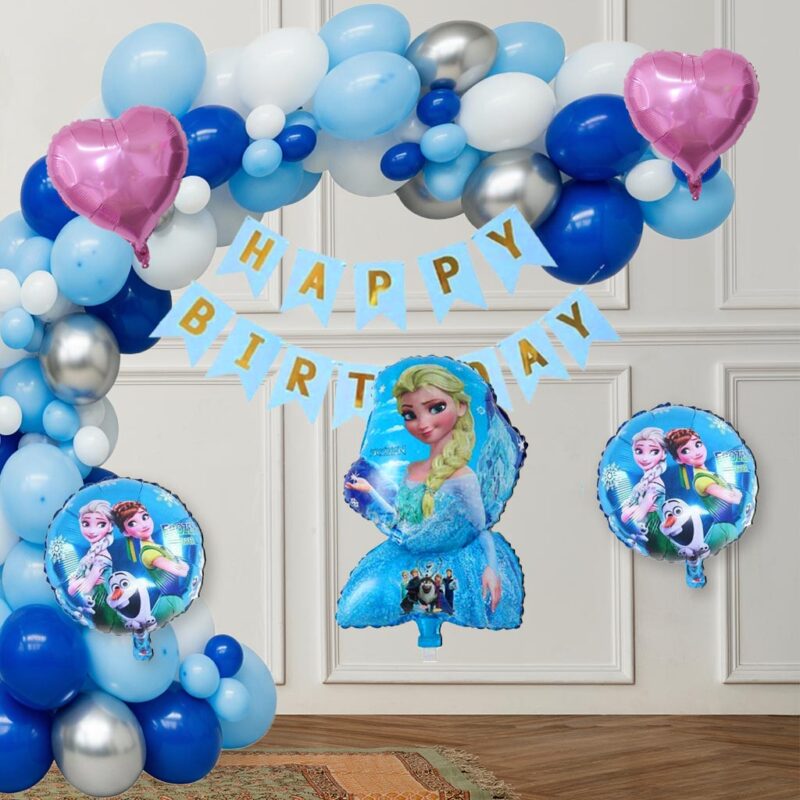 A large balloon arch decorated with blue, light blue, white, and silver metallic balloons, along with pink heart foil balloons and a 5-in-1 Frozen theme foil balloon set, creating an enchanting Frozen Theme Birthday Kit display.